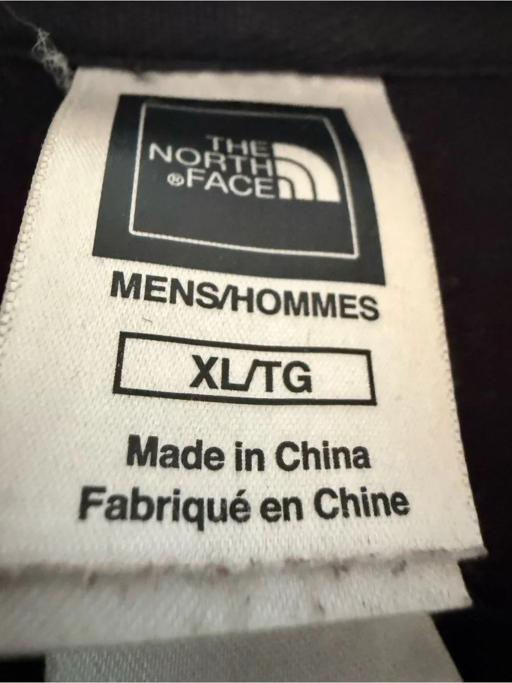 The North Face Black Jacket with Red Logo Patch